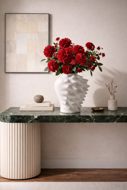 Modern white sculptural vase with textured ripple design for luxury interiors