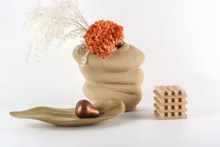 Leaf shaped bohemian tray with organic curves and natural finish.