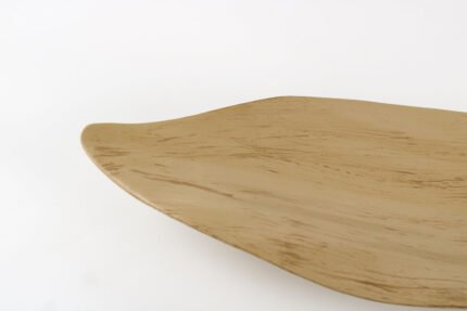 Leaf shaped bohemian tray with organic curves and natural finish.