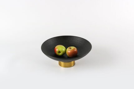 Modern black and gold decorative bowl with apples, Midnight Glow design.