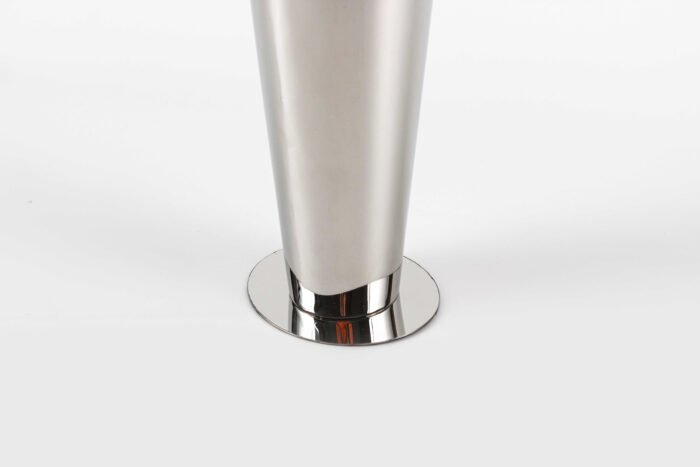 Tall silver sculptural vase with reflective finish and curved design – handcrafted for modern interiors