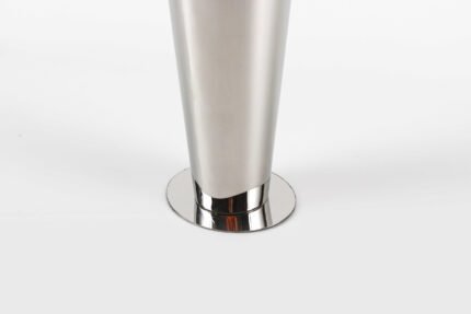 Tall silver sculptural vase with reflective finish and curved design – handcrafted for modern interiors