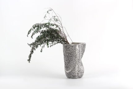 Textured artisan vase with cracked surface design and flowing silhouette – handcrafted decorative object for modern homes