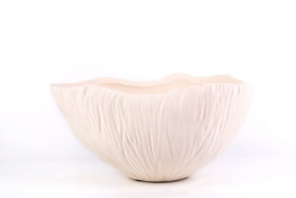 Textured minimalist white bowl with wave-inspired shape, Waves of Calm.