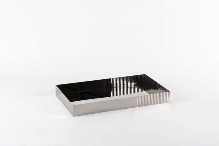 Onyx Reflection Stainless Steel Tray – rectangular stainless tray with black mirrored base and fluted sides.