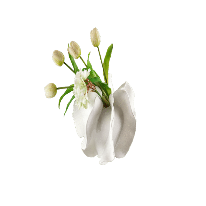 White sculptural vase with folded petal-like form and white tulips – artisan handcrafted floral vessel