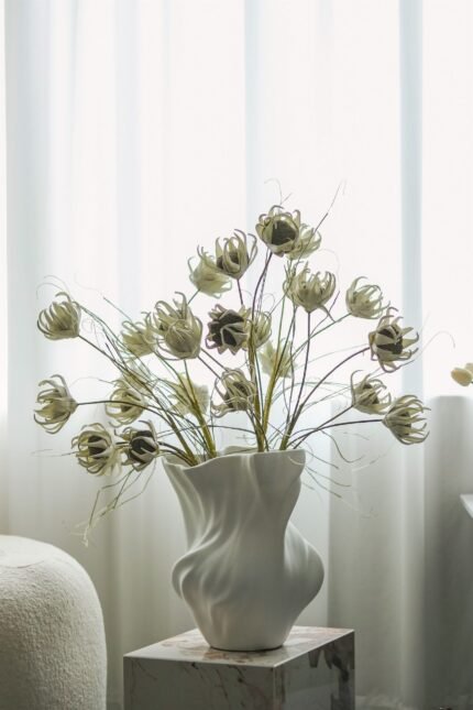 white flowing decorative vase UAE product view for modern interiors