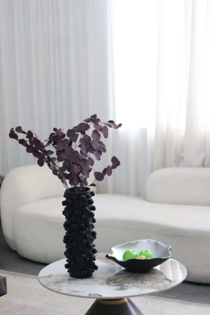 black textured sculptural vase UAE tall product view