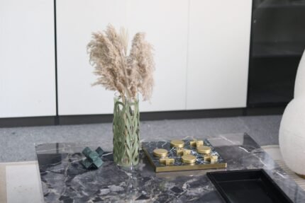 green sculptural vase UAE styled as a modern statement accent