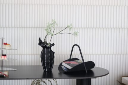 black sculptural decorative vase UAE close-up showing textured statement design