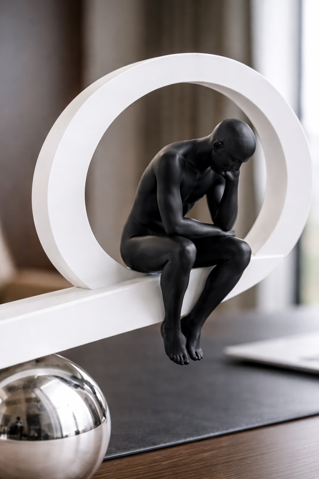 Modern metallic balance decor with black figurine and silver spheres – Equilibrium Line by MAZART